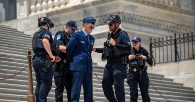 Air Force major arrested on Capitol steps during protest calling for Trump impeachment